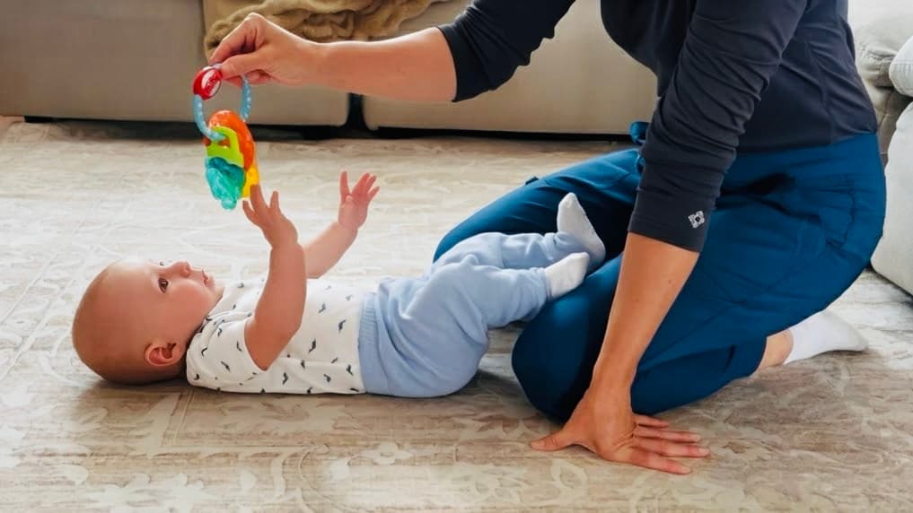 Happy baby during physical therapy session