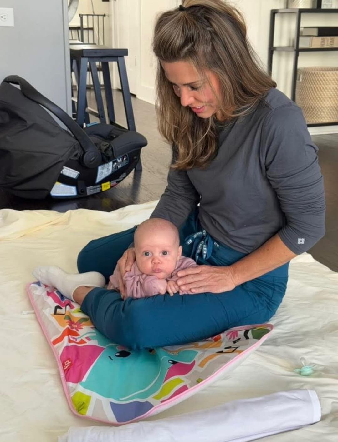 Peaceful sleeping baby wrapped in soft blanket